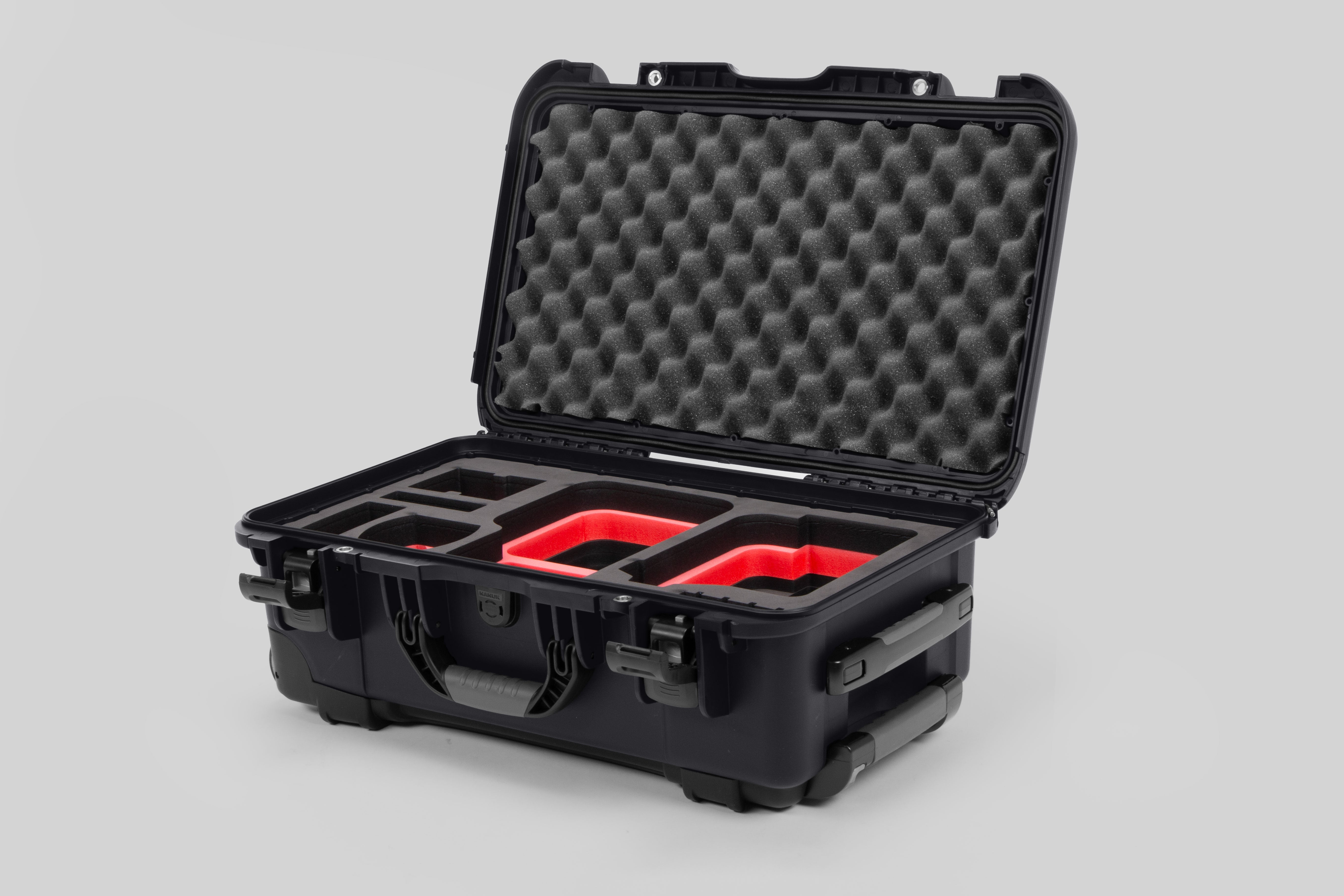 Angle view of Graphite Color Canon C400 Camera Carry-on Case and Red Layer Custom Foam Insert