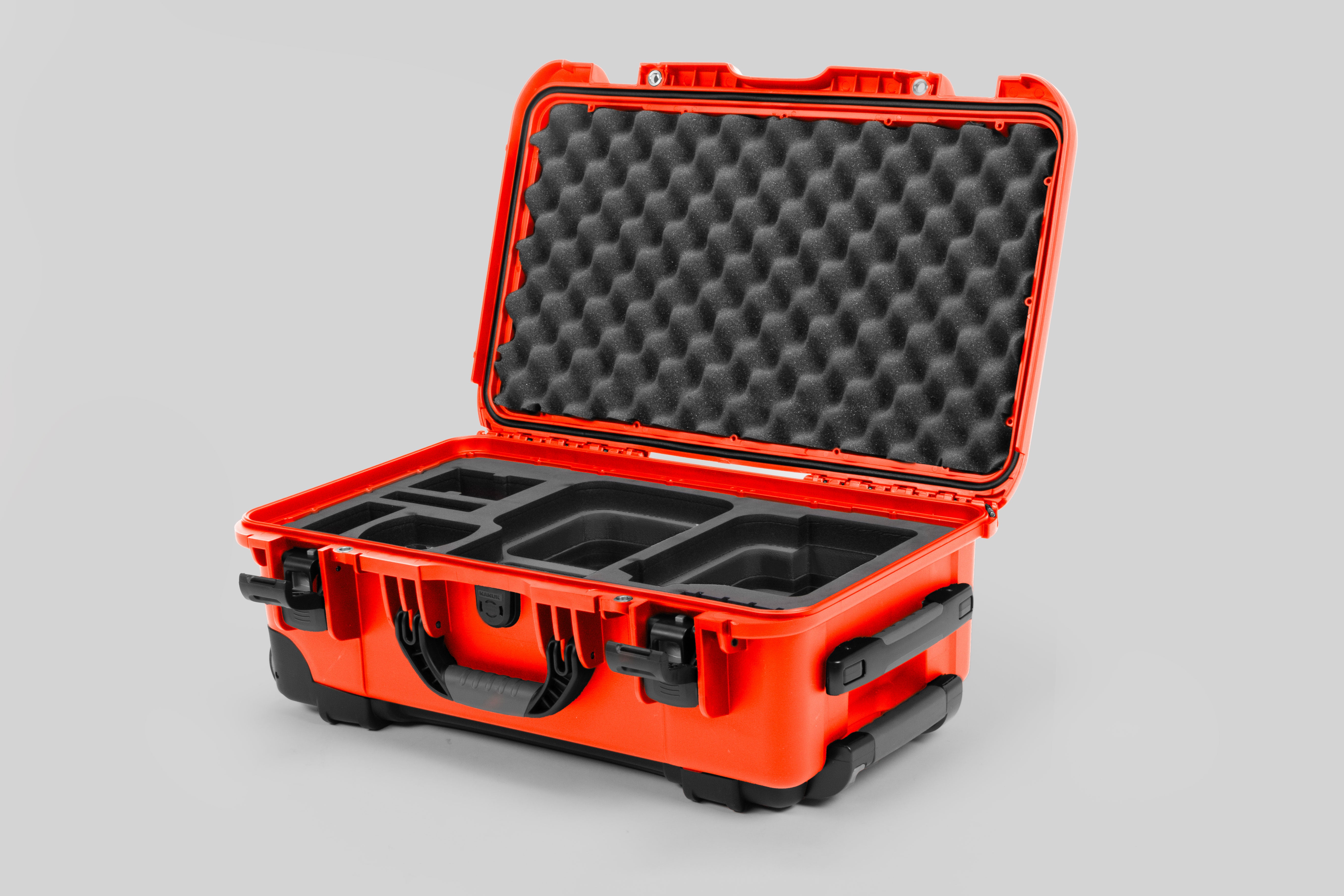 Angle view of Orange Color Canon C400 Camera Carry-on Case and Black Layer Custom Foam Insert