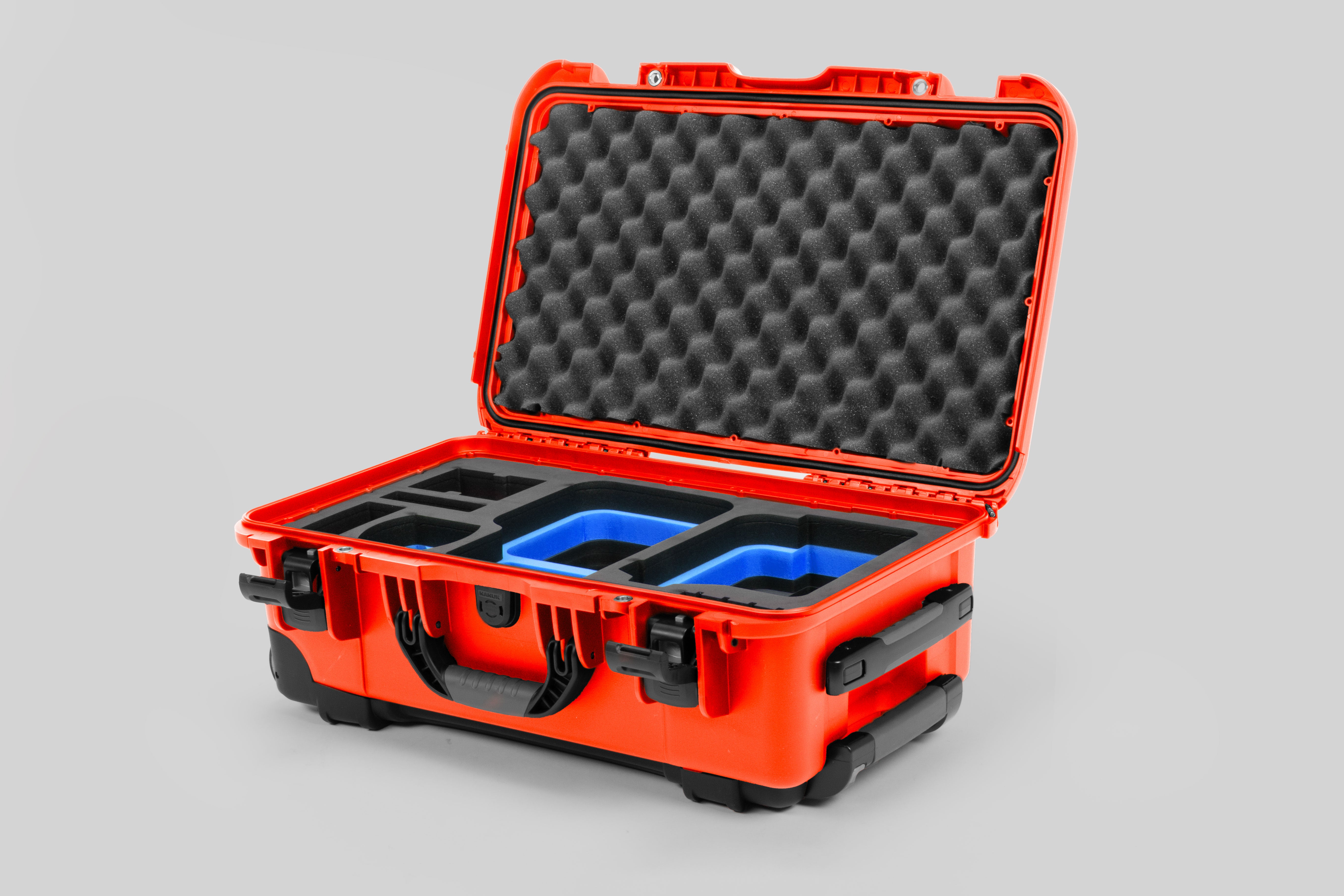 Angle view of Orange Color Canon C400 Camera Carry-on Case and Blue Layer Custom Foam Insert