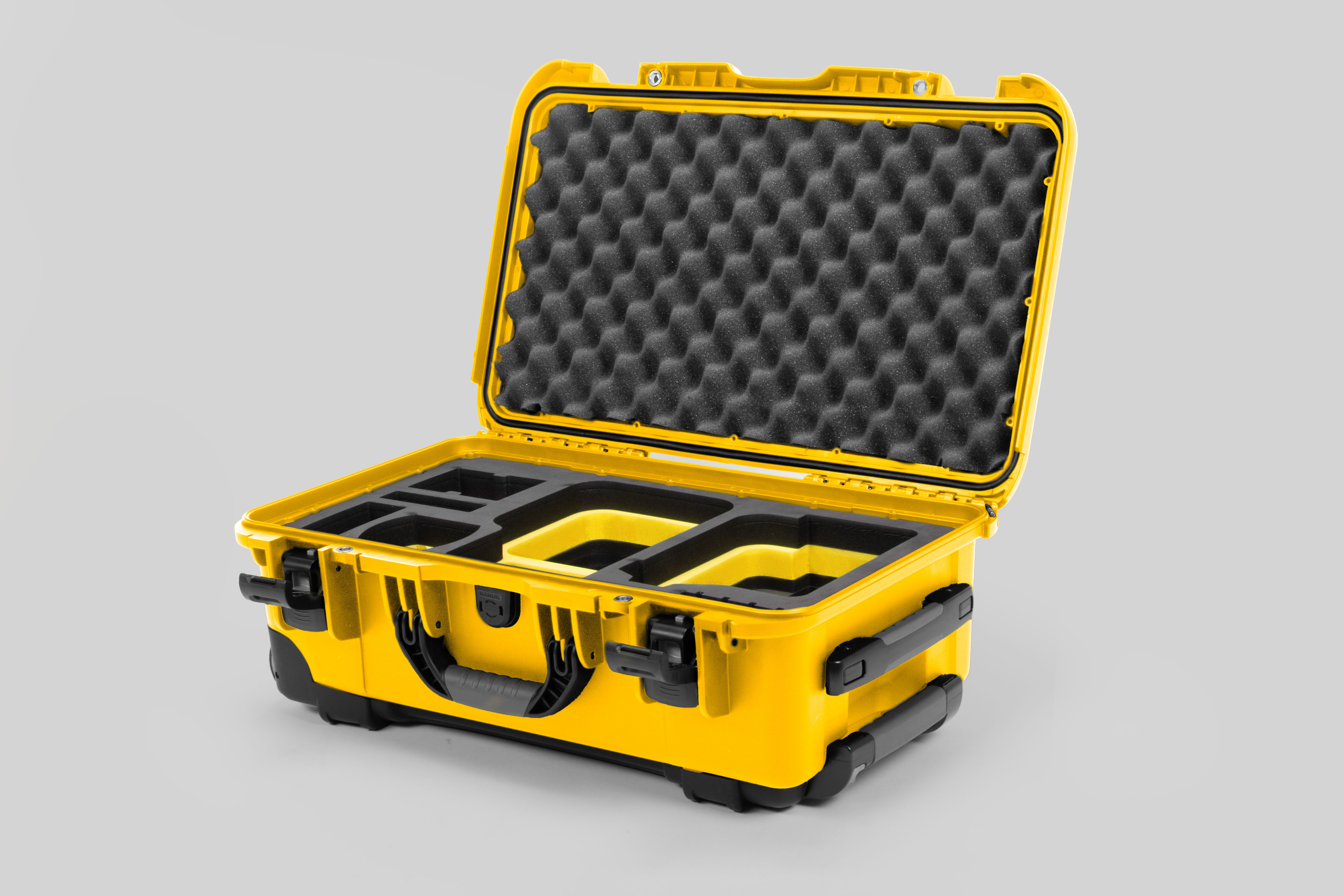 Angle view of Yellow Color Canon C400 Camera Carry-on Case and Yellow Layer Custom Foam Insert