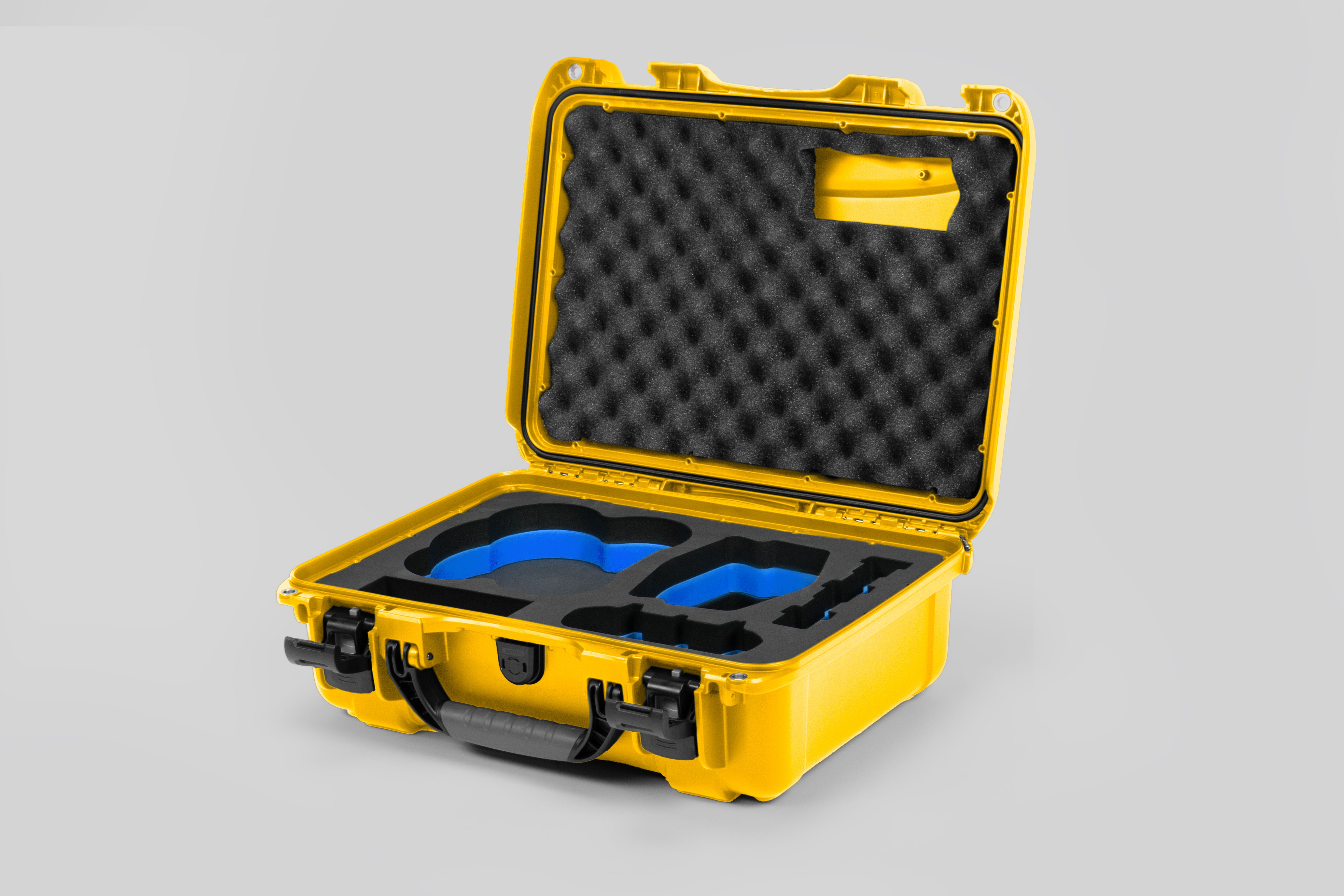 Angled view of DJI Avata 2 Fly More Combo Yellow Color Waterproof Hard Case and Custom Foam Insert with a Blue Layer