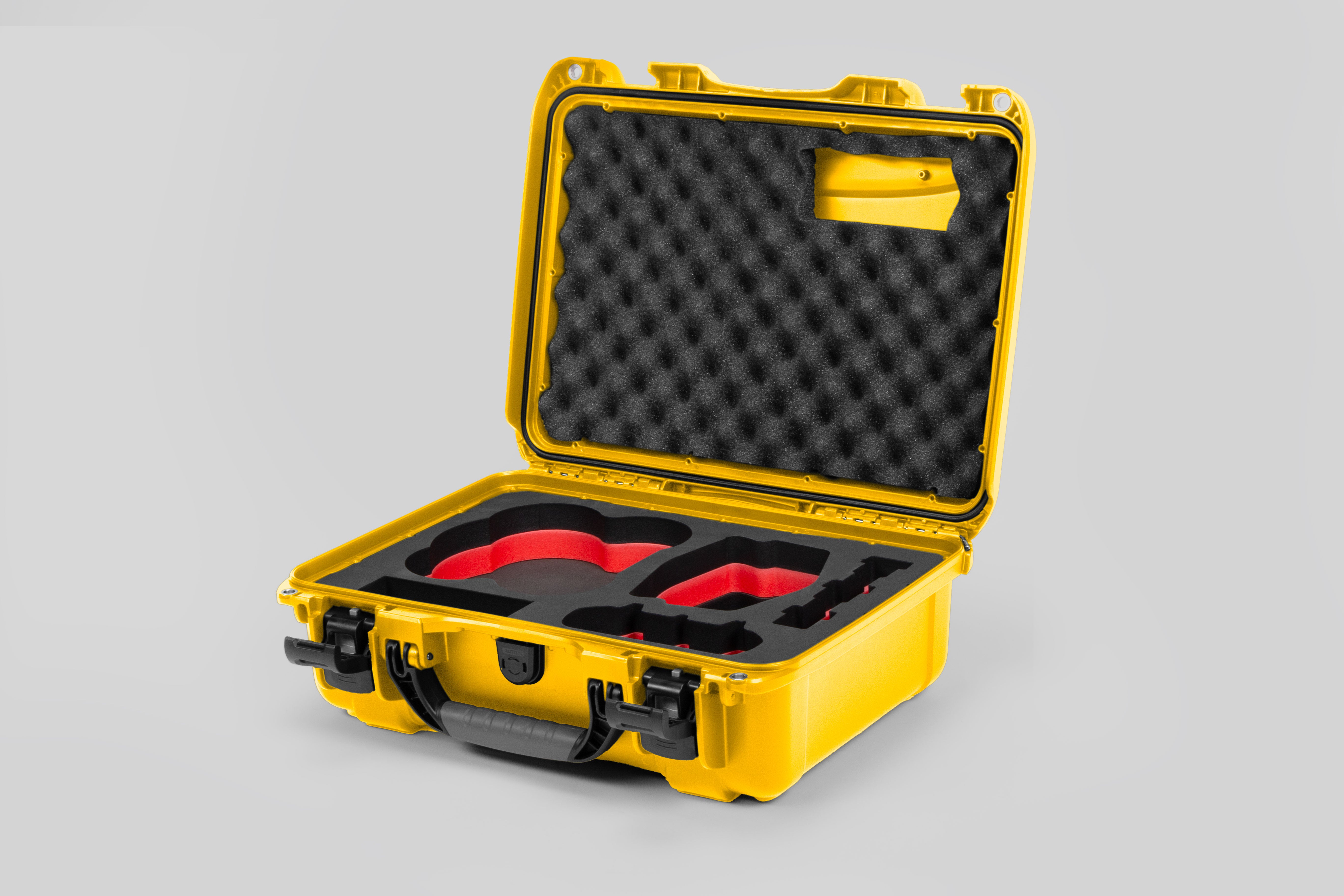 Angled view of DJI Avata 2 Fly More Combo Yellow Color Waterproof Hard Case and Custom Foam Insert with a Red Layer