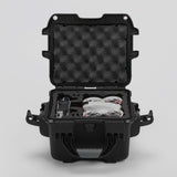 Front view of DJI Neo Black Color Adventure Ready Compact Waterproof Carry-on Case and Custom Foam Insert with a Red Layer, holding the DJI Neo Combo