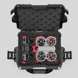Top view of DJI Neo Black Color Adventure Ready Compact Waterproof Carry-on Case and Custom Foam Insert with a Red Layer, holding the DJI Neo Combo