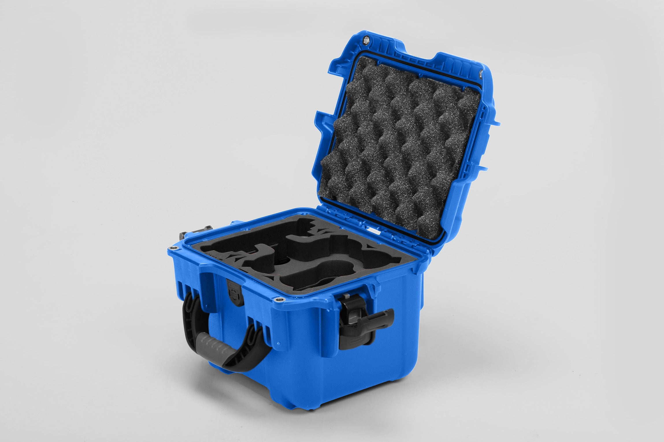 Angled view of DJI Neo Blue Color Adventure Ready Compact Waterproof Carry-on Case and Black Custom Foam Insert