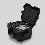 Angled view of DJI Neo Black Color Adventure Ready Compact Waterproof Carry-on Case and Custom Foam Insert with a Red Layer, holding the DJI Neo Fly More Combo