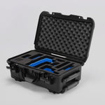Angled view of Foama Black Color Travel Case and Custom Foam Insert with Blue Layer for RED Monstro