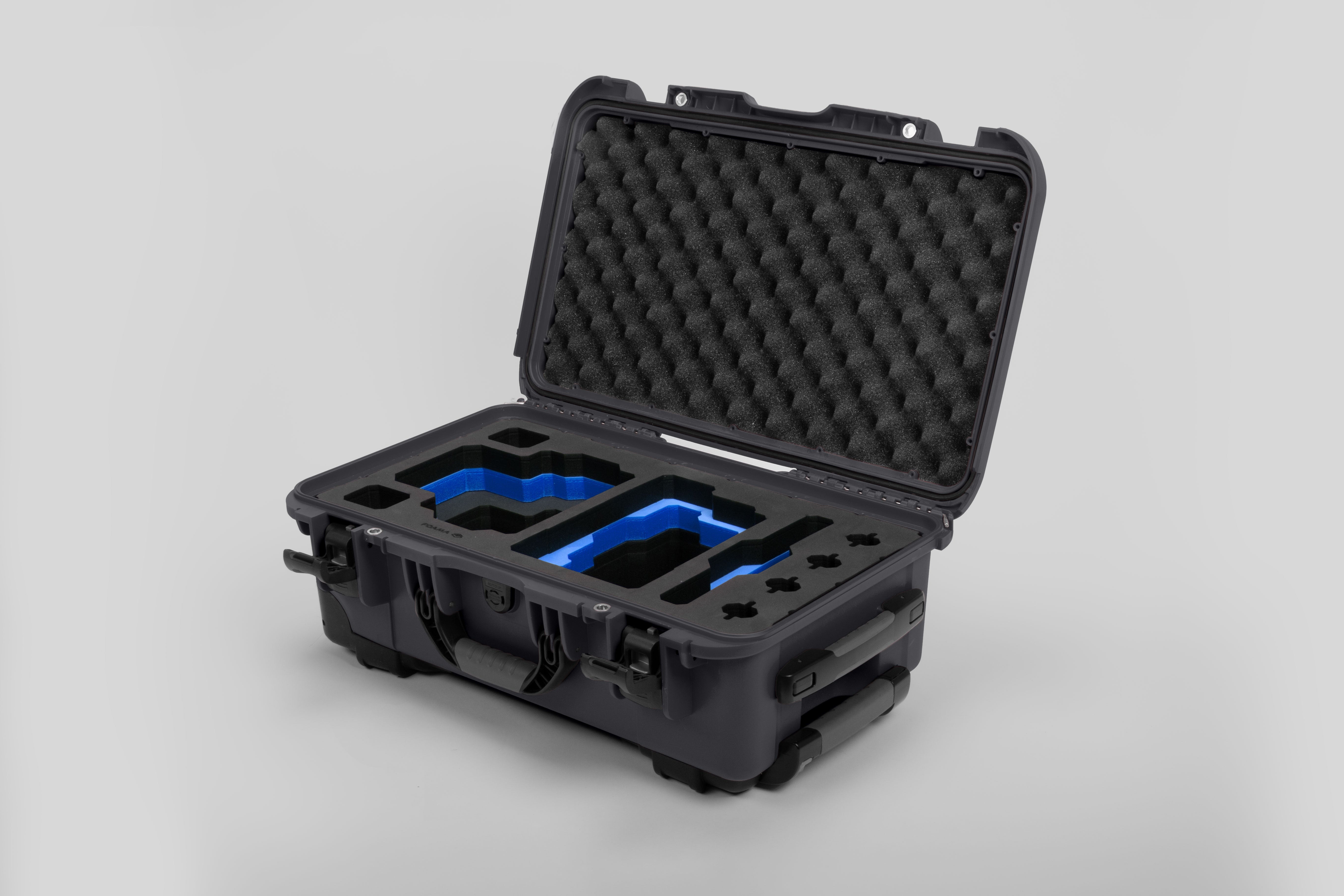Angle view of Graphite Color RED V Raptor Carry-On Case with Blue Layer Custom Foam Insert