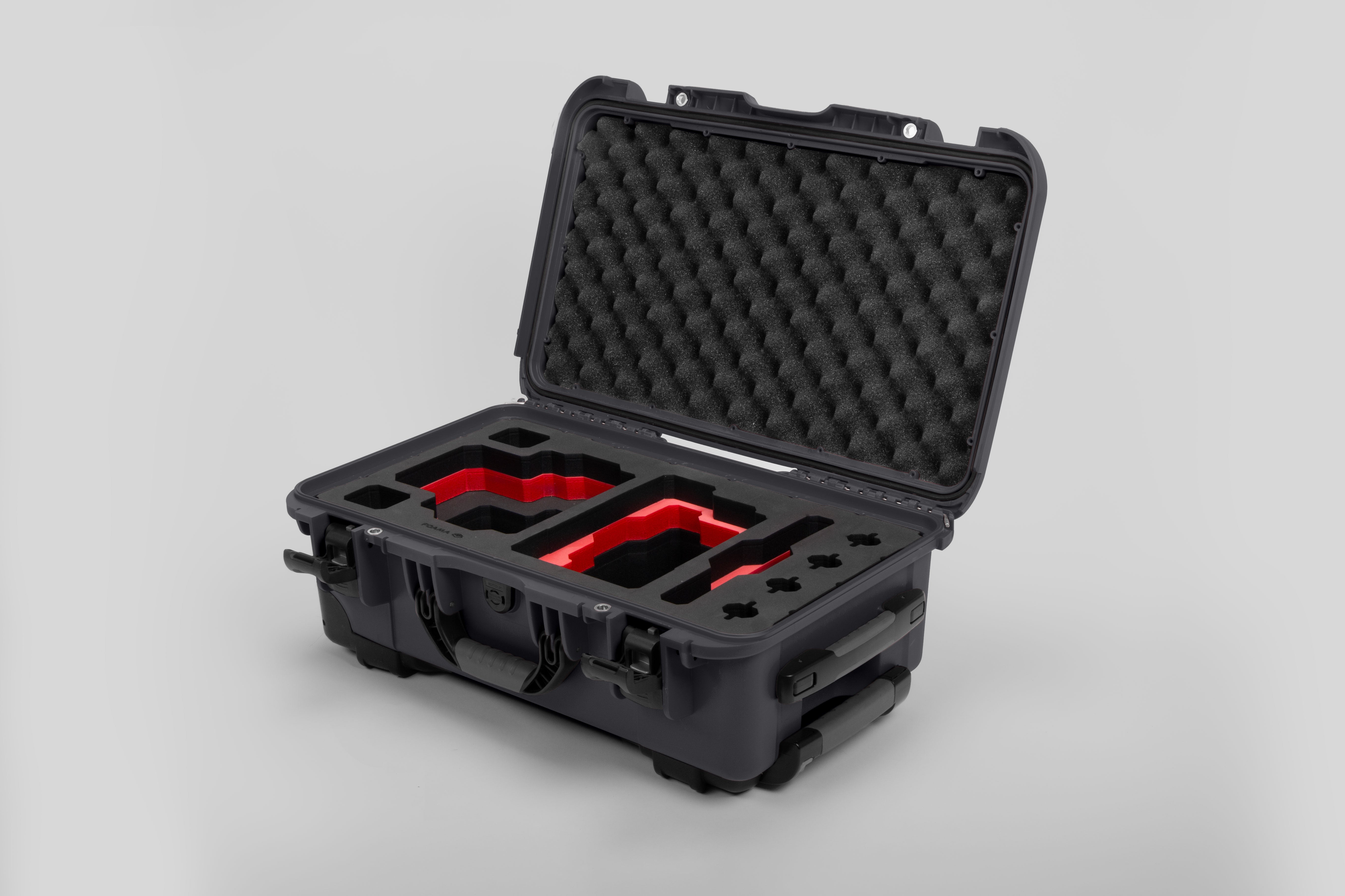 Angle view of Graphite Color RED V Raptor Carry-On Case with Red Layer Custom Foam Insert