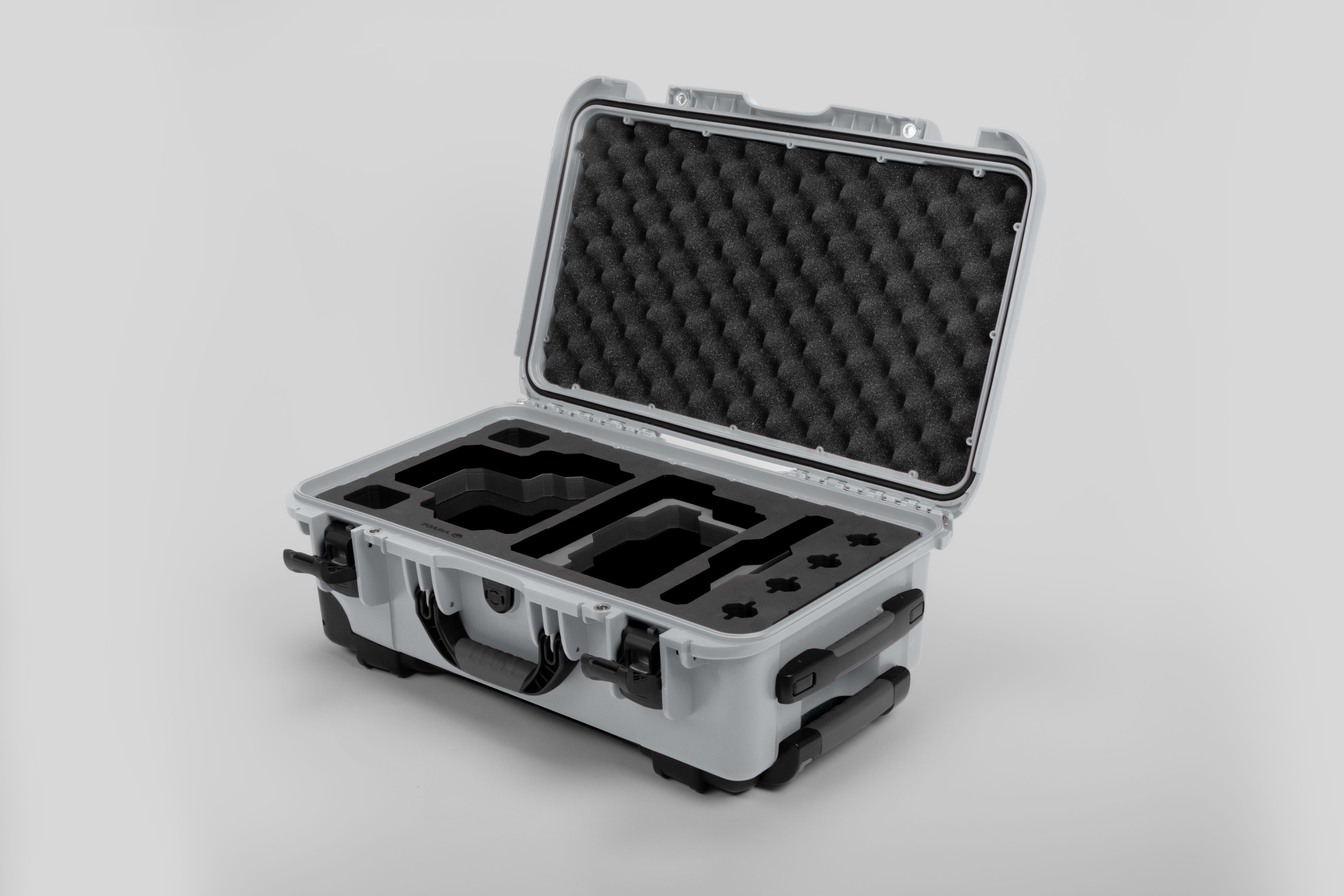 Angle view of Silver Color RED V Raptor Carry-On Case with Black Layer Custom Foam Insert