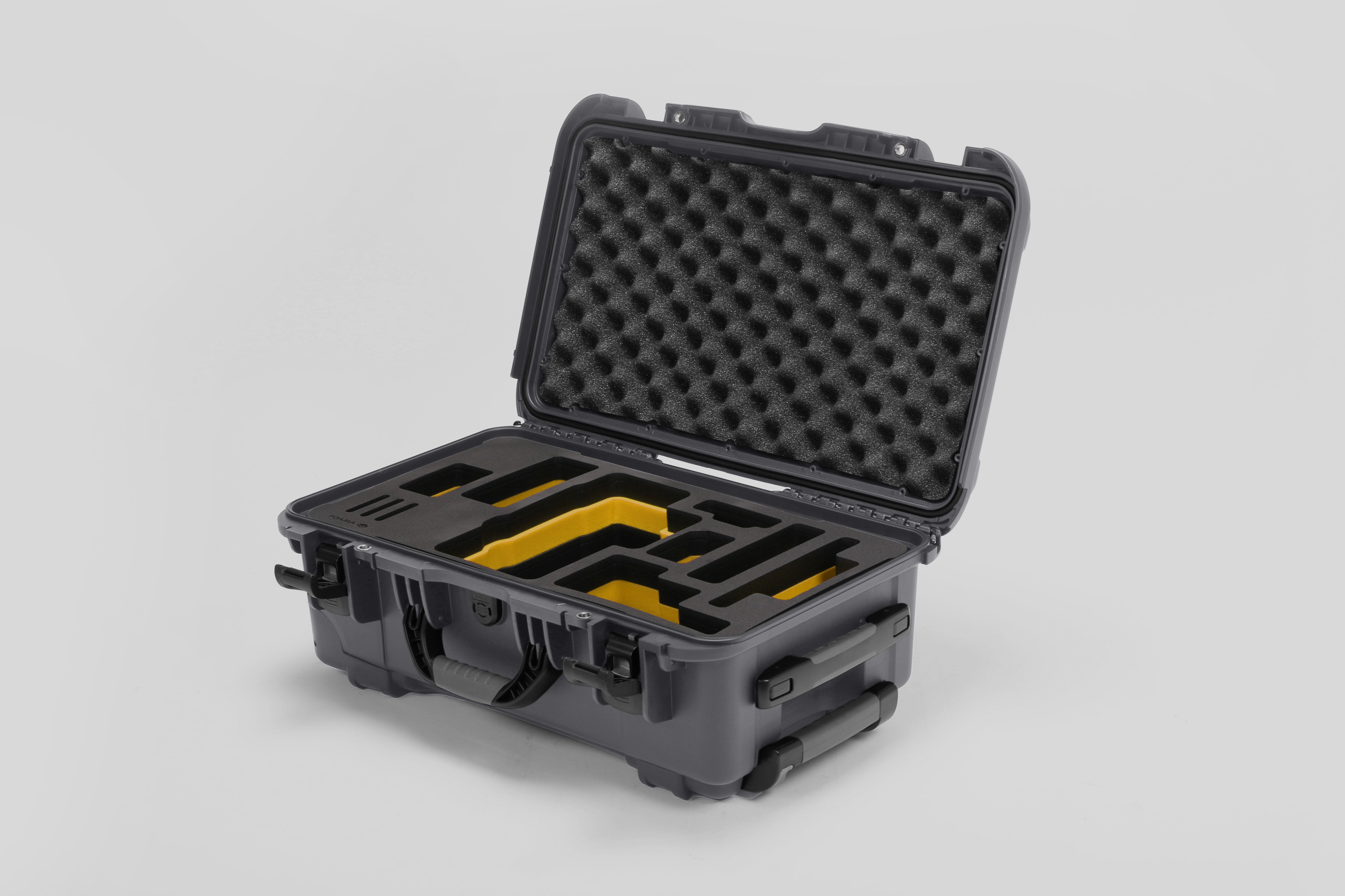 Angled view of Foama Graphite Color Travel Case and Custom Foam Insert with Yellow Layer for RED Monstro