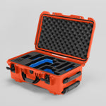 Angled view of Foama Orange Color Travel Case and Custom Foam Insert with Blue Layer for RED Monstro