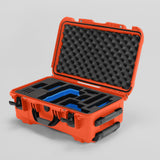 Angled view of Foama Orange Color Travel Case and Custom Foam Insert with Blue Layer for RED Monstro