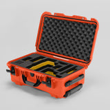 Angled view of Foama Orange Color Travel Case and Custom Foam Insert with Yellow Layer for RED Monstro