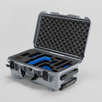 Angled view of Foama Silver Color Travel Case and Custom Foam Insert with Blue Layer for RED Monstro