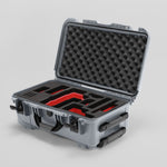 Angled view of Foama Silver Color Travel Case and Custom Foam Insert with Red Layer for RED Monstro