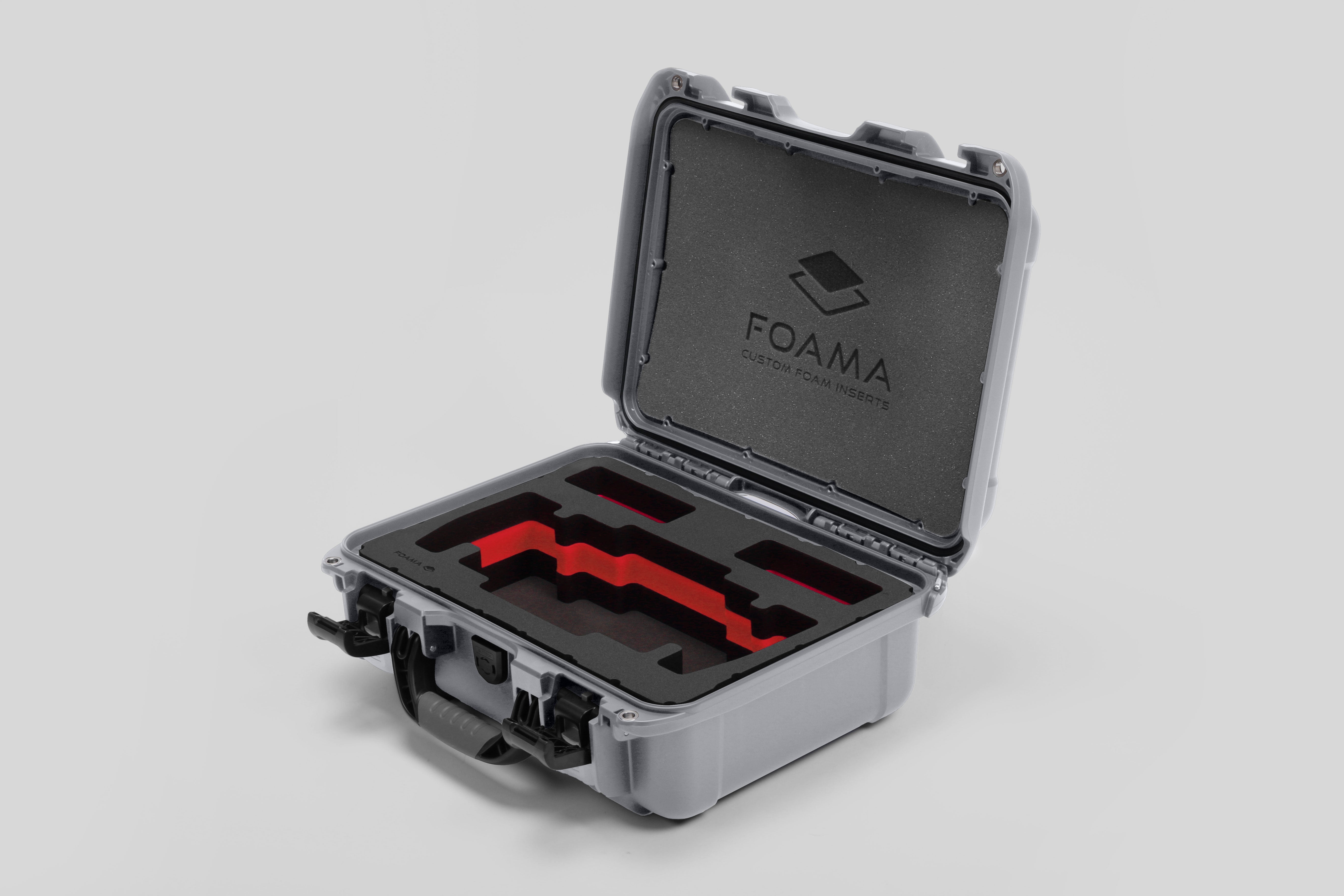 Angled view of Foama Silver Color Travel Case and Custom Foam Insert with Red Layer for SmallHD 703 Bolt Pro