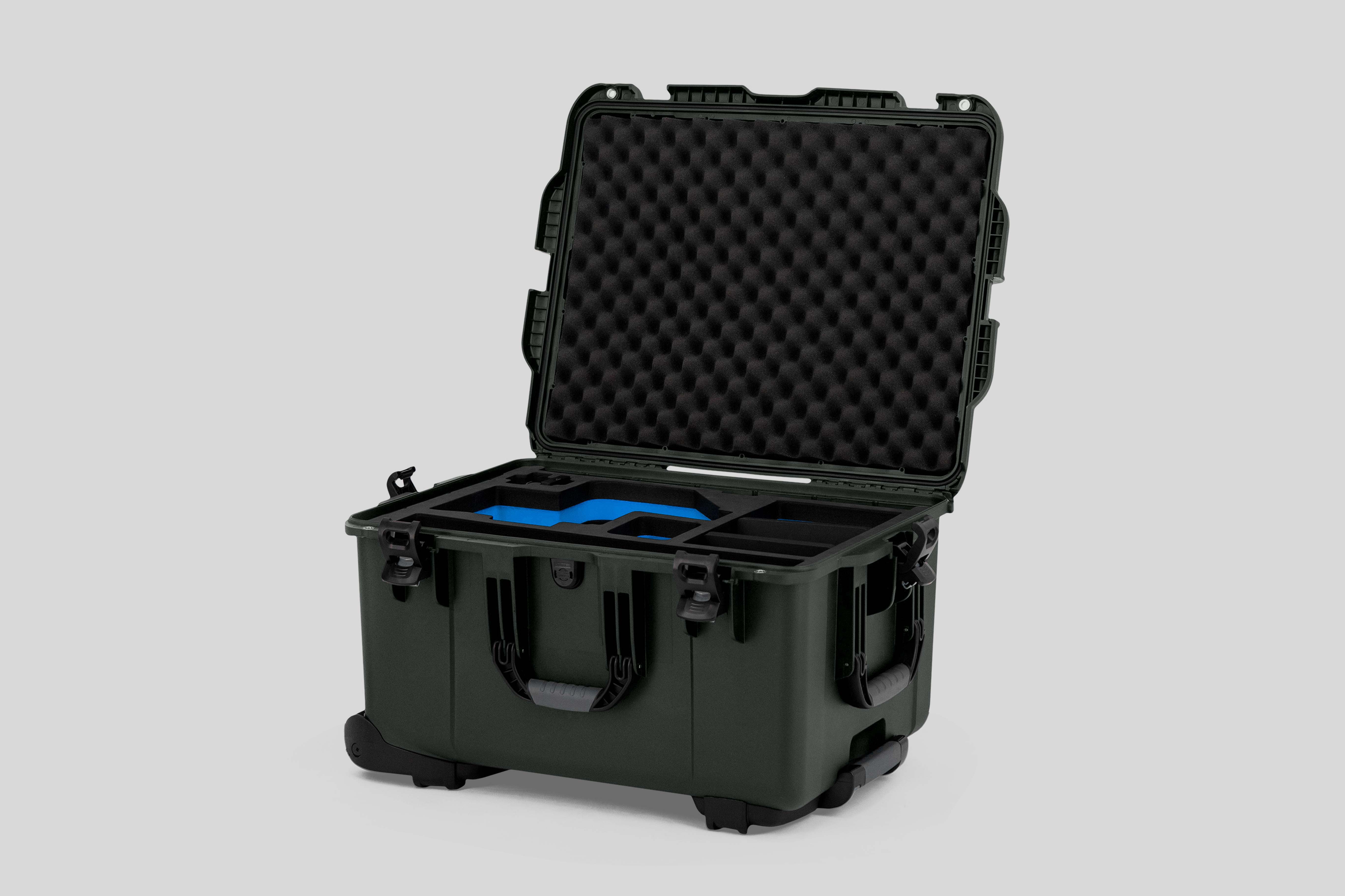 Angle view of Olive Color Sony Burano Heavy Duty Roller Case and Custom Foam Insert with Blue Layer  for Burano Camera And Accessories