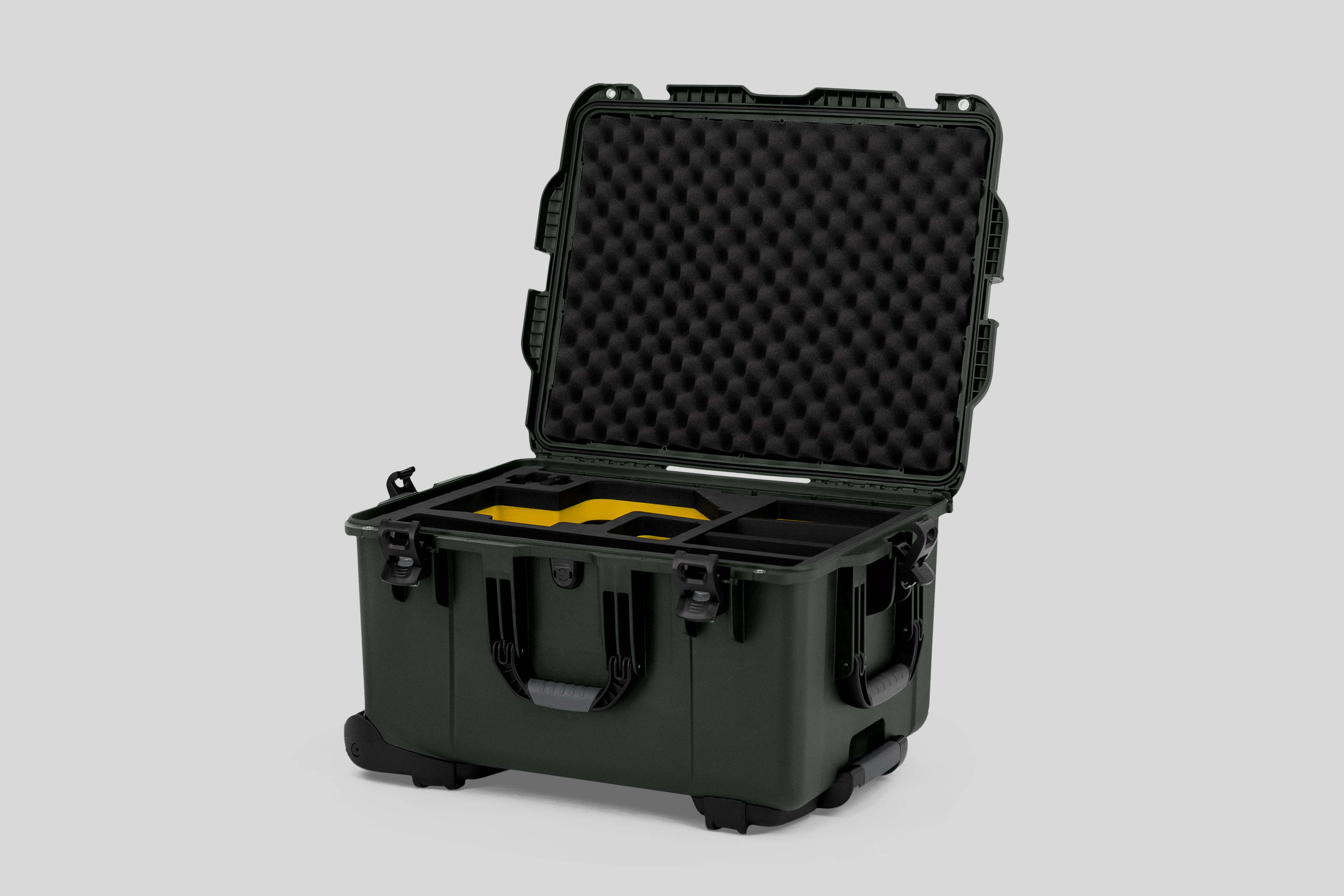 Angle view of Olive Color Sony Burano Heavy Duty Roller Case and Custom Foam Insert with Yellow Layer for Burano Camera And Accessories