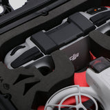 Close-up view 2 of DJI Neo Black Color Adventure Ready Compact Waterproof Carry-on Case and Custom Foam Insert with a Red Layer, holding the DJI Neo Combo